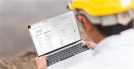 A worker uses Buildots' platform on a laptop. (Image: Buildots)